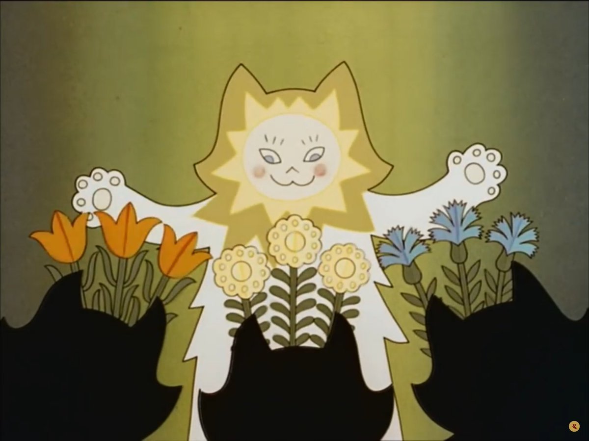 A cat is joined by three in the foreground bearing flowers